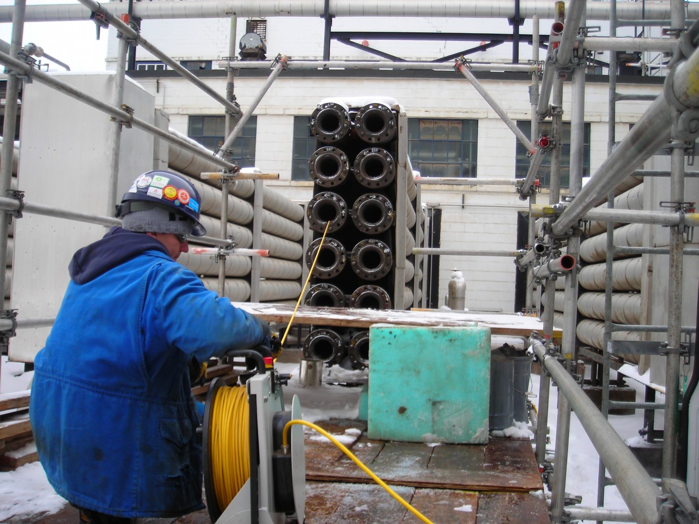 Technician completing a push reel inspection.
