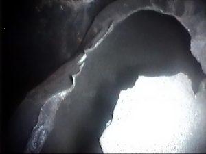 Video scopes are excellent tools for probing the shellsides of exchangers for fouling, corrosion, or other concerns. This image shows the growth of bacteria on the shellside of a cooling water exchanger. This bacteria is associated with corrosion and wall loss