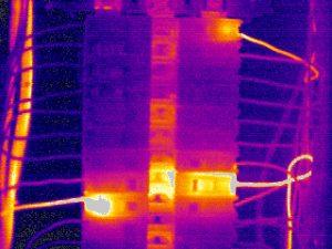 This image identifies loose connections, an overloaded circuit, and a faulty breaker on this common type of electrical panel. As with all electrical problems, the resulting failures could have serious consequences for the equipment, property, and personnel involved